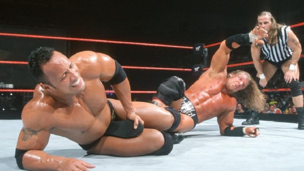 The Rock vs Triple H