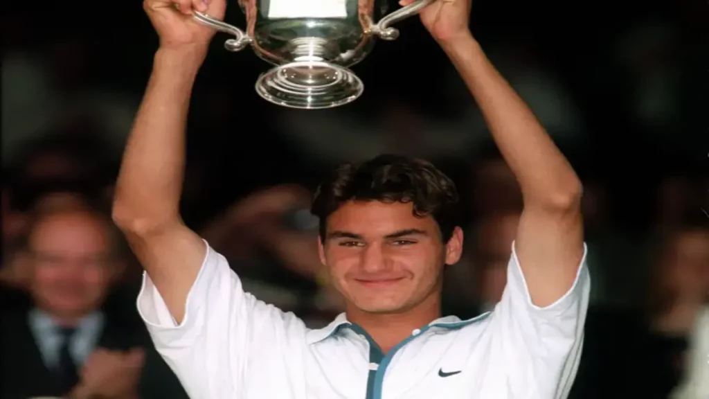 Roger Federer's childhood photo winning a cup.