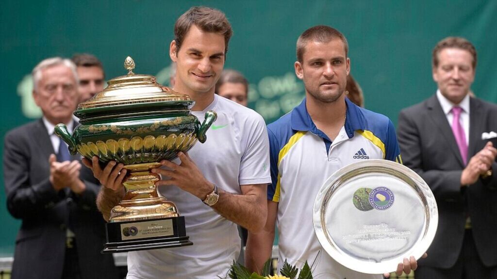 Roger Federer and Mikhail Youzhny