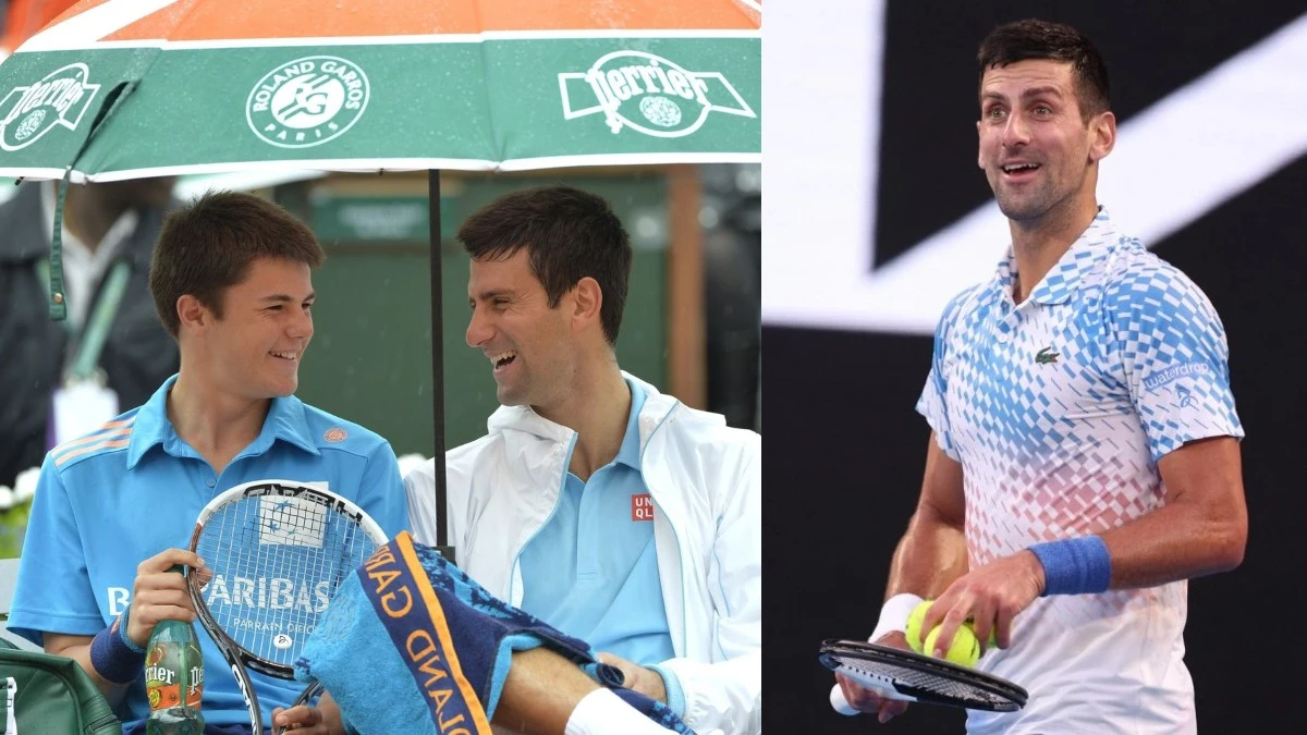 Novak Djokovic holds umbrella for ballboy